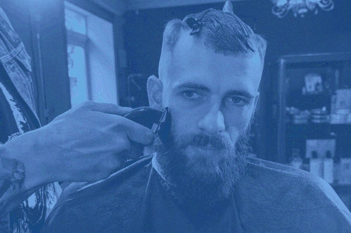 Close up of clipper work shaping a beard